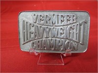 Vermeer Heavy weight champion belt buckle.