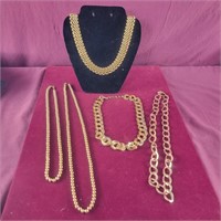 Group of Gold Colored Necklaces