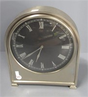 Mantle clock. Measures 11" H x 9.25" W.
