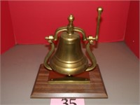 BRASS BELL MOUNTED ON WOOD