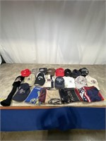 Assortment of Golf hats and towels