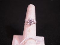 14K white gold ring with round CZ and baguettes,