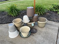 Several plastic flowerpots