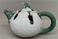 Tea pot with frog on top