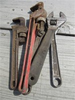 Adjustable wrenches and pipe wrench