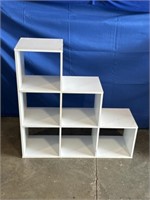 Tiered shelf, dimensions are 36 x 12 x 36