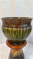 Antique potter  flower pot, with a brown top glaze