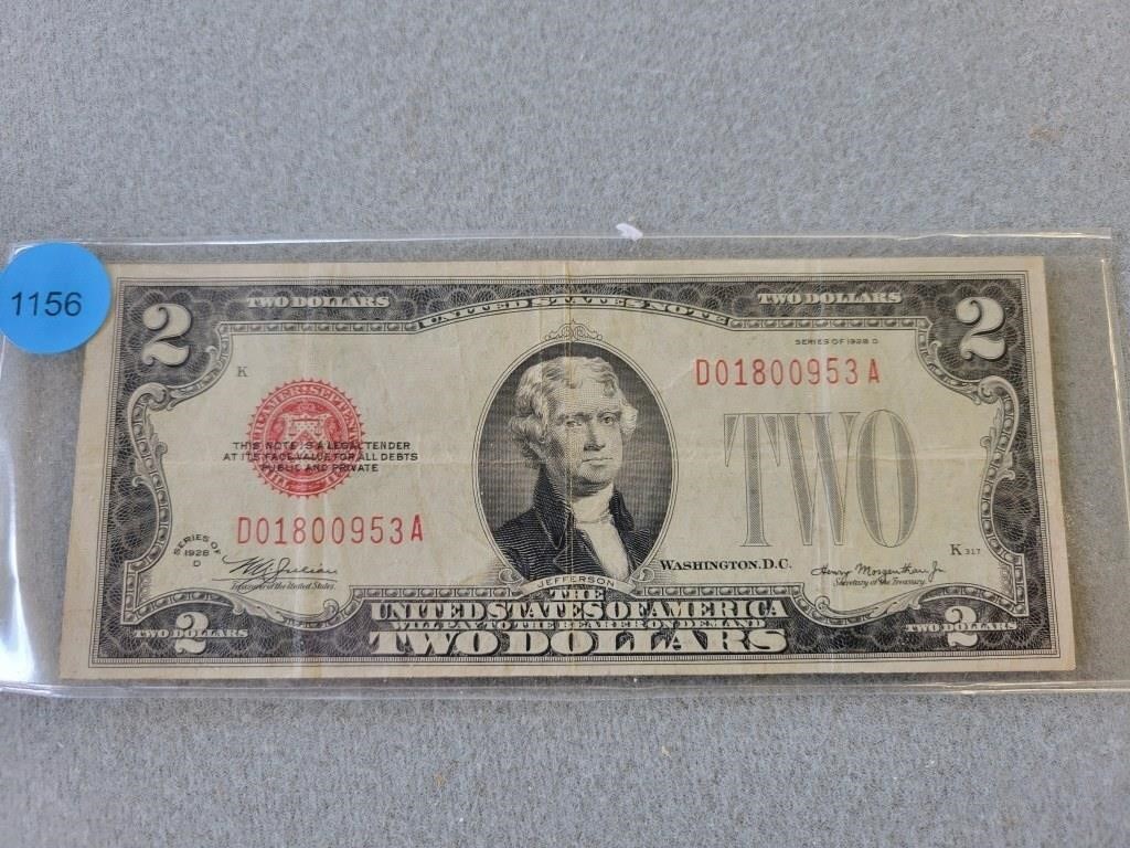 1928d $2.00 bill.  Buyer must confirm all currency