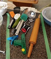 lot of cooking utensils, rolling pins, etc.