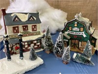 Christmas village barn and general store, trees