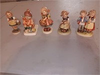 5 Hummel figurines, 4 to 4.5 inches tall.