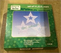 In original box - set of three LED stars. Untested