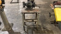 Electric Grinder Mounted to a Metal Table