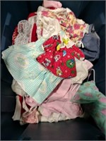 Lot of doll  clothes different sizes