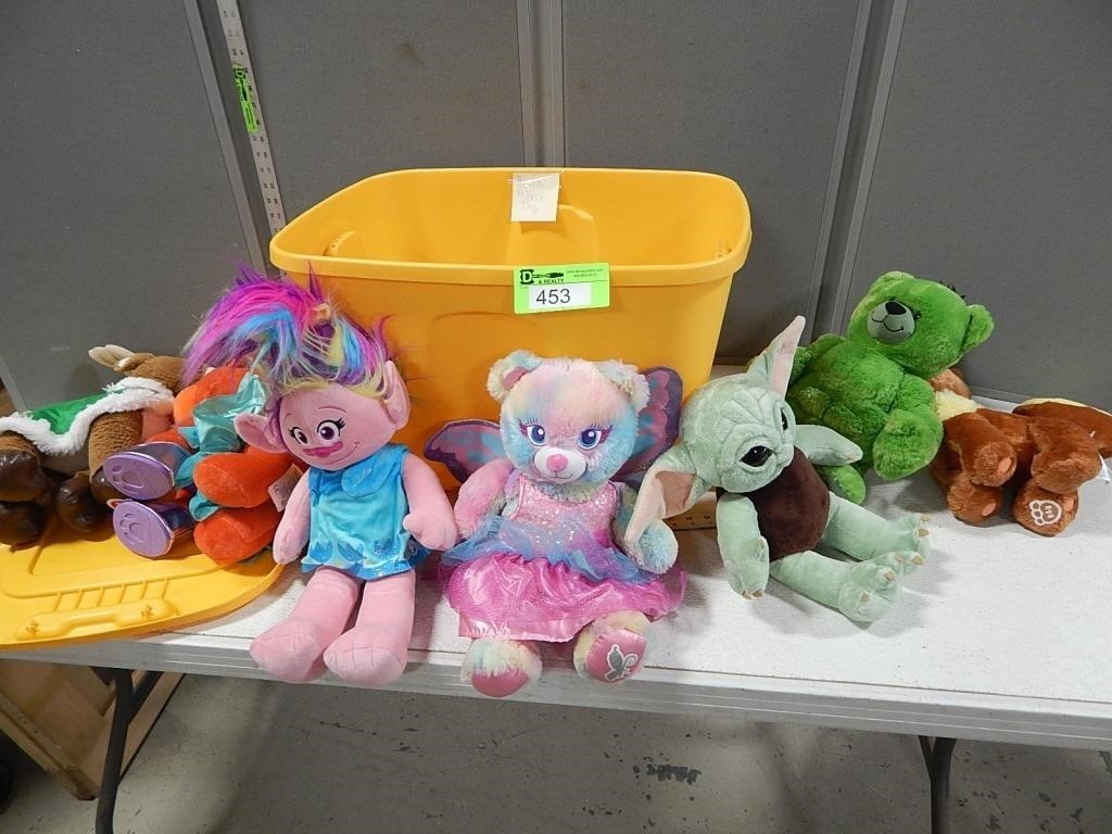 Build-A-Bear plush toys in a tote with lid