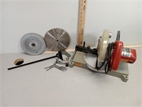Miter saw with extra blades.