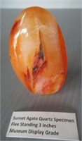 Sunset agate quartz specimen. Measures 3" across.
