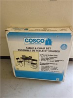 Costco fold up table and chairs still in packaging