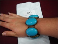 Bulky Faux Turquoise and Brass Tone Oval Bracelet
