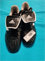 New pair Adidas youth cleats, size 4.5