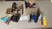 Two boxes of miscellaneous, including lighter