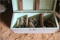lot of plumbing items in wood box