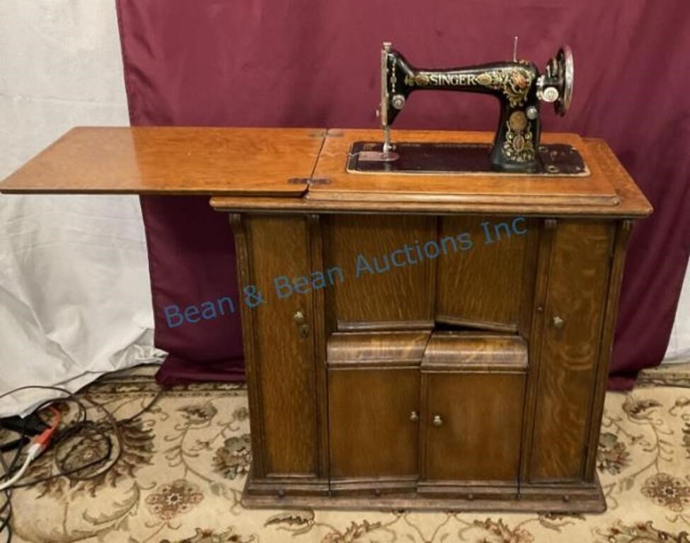 Unusual oak sewing cabinet w/ singer red eye