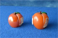 Two Orient & Flume Peach Paperweights