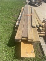 LARGE STACK MIXED LUMBER SOME TREATED