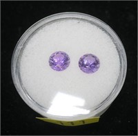 Pair of round brilliant cut amethysts, approx.