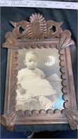Metal frame with old time photo
