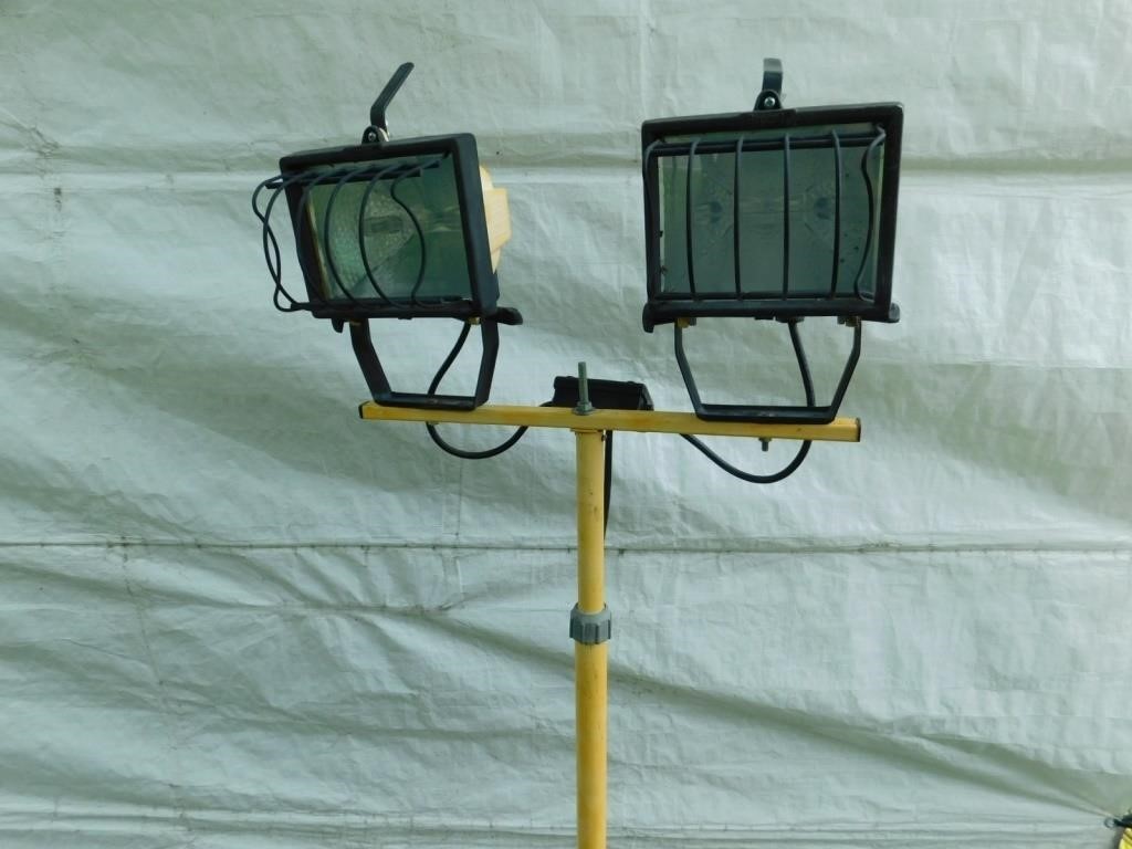 Outside portable LED flood lamp with stand, works