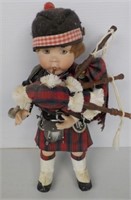 Bag pipe doll.