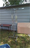 Adjustable clothes rack w/ casters