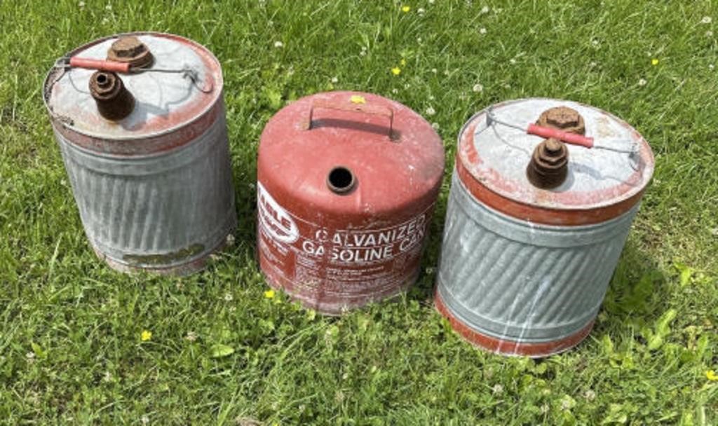 Grouping of 3 metal gas cans