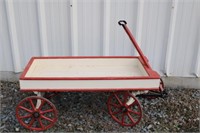 Red and white cast iron wheel wagon circa 1900