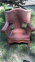 Vintage wicker arm chair for indoor or outdoor use