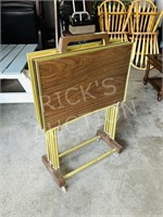 set of vintage tv trays on stand