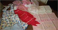 Two pair handwork pillowcases and 6 aprons