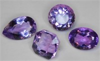 (4) AMETHYSTS. TOTAL WEIGHT: 50.28 CTS.