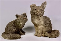 2 cast stone foxes - 10" & 13" tall, 7" & 11" wide