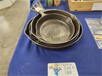 FIVE CAST IRON SKILLETS