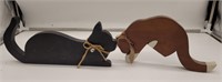 Wooden and plaster cat silhouettes