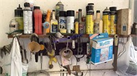 Paints, oils, cleaners, shelf full