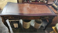 Antique French desk with metal embellishments