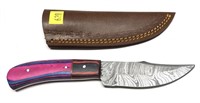 Custom Damascus steel knife with embossed