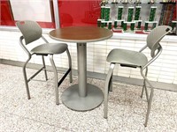 elevated table & 2 stools