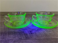 Stunning Uranium glass cup and saucer sets