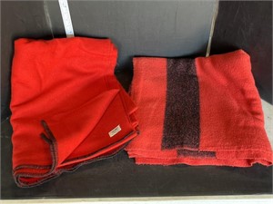 2 red wool blankets