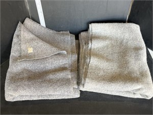 2 grey wool blankets